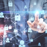 businessman-using-glowing-digital-padlock-interfac Businessman using glowing digital padlock interfac