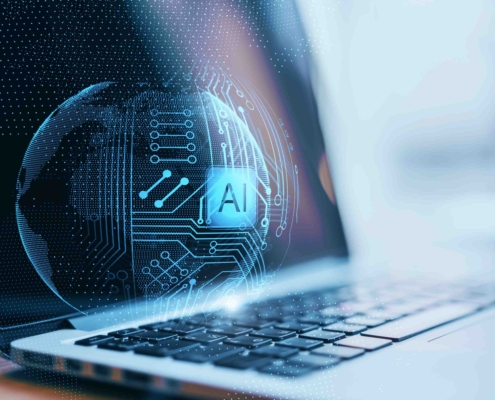 Laptop mit holographischem AI Symbol und digitaler Schnittstelle